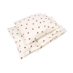 Linge de lit bébé Lucky en coton bio avec motif coléoptère rouge sur fond blanc cassé