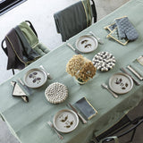 Galette de chaise Grace Matcha posée sur une chaise, style moderne et chic