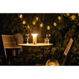Lampe LED Ramsey beige, ambiance lumineuse dans un salon