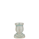 Vue latérale du pot de fleur J-Line Hoofd Zeeman sur une table en bois.
