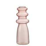 Vase Luna en verre rose, vue de face avec détails élégants