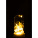 Détail du cerf en résine sous la cloche en verre, ambiance lumineuse