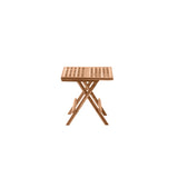 Table d'appoint en teck repliée pour un rangement facile