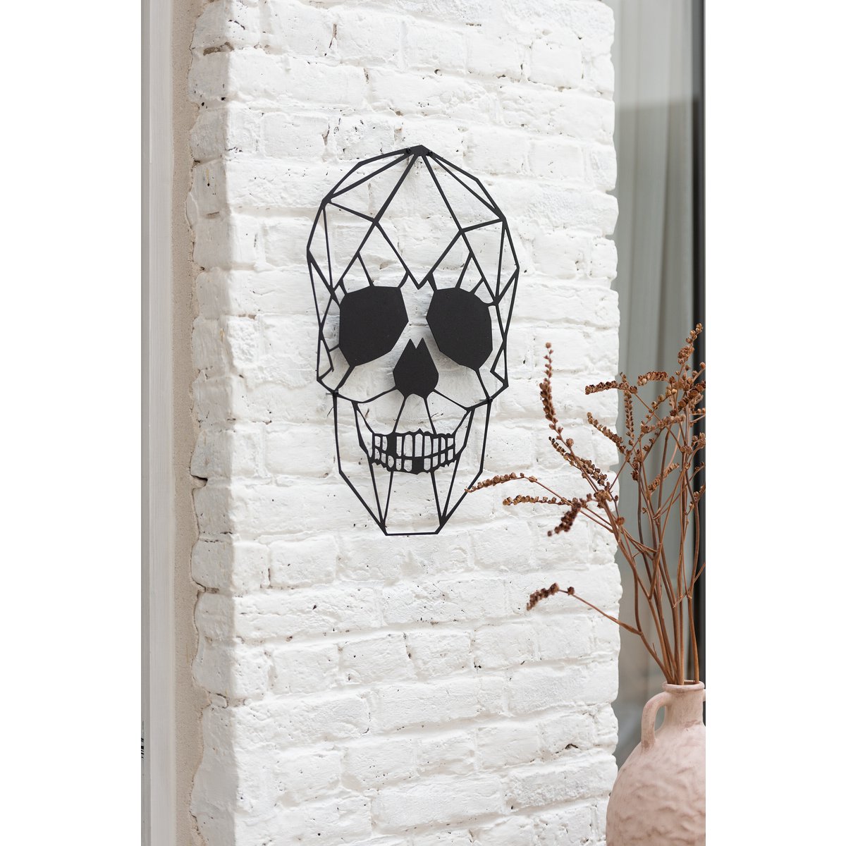 Détail du crâne en métal noir - décoration murale J-Line