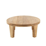Table basse ronde J-Line dans un salon moderne