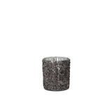 Bougeoir J-Line Glitter avec bougie allumée dans un salon moderne