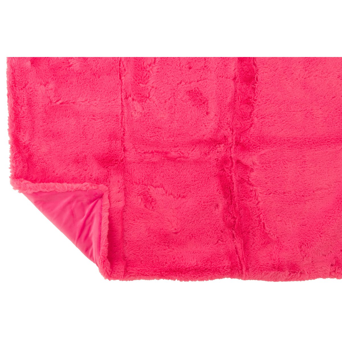 Couverture J-Line Cutie drapée sur un canapé moderne