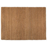 Tapis Elliot Bronze sur un sol en bois - mise en valeur du style