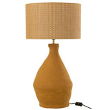 Détail de la lampe J-Line Indus en papier mâché jaune sur une table