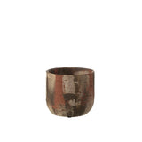 Détail du pot de fleurs Miltos, céramique de qualité, ambiance chaleureuse.
