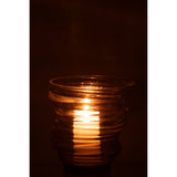 Vase Tornado en verre gris sur une table en bois, ambiance chaleureuse