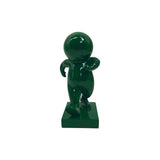Statue Amigo Marchant en polyresine verte, vue de face sur fond blanc