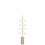 Arbre décoratif J-Line dans un salon moderne, créant une ambiance festive.