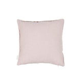 Détail du tissu velours et lin du coussin vintage vieux rose