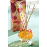 Diffuseur Tequila Sunrise en verre orange avec bâtons