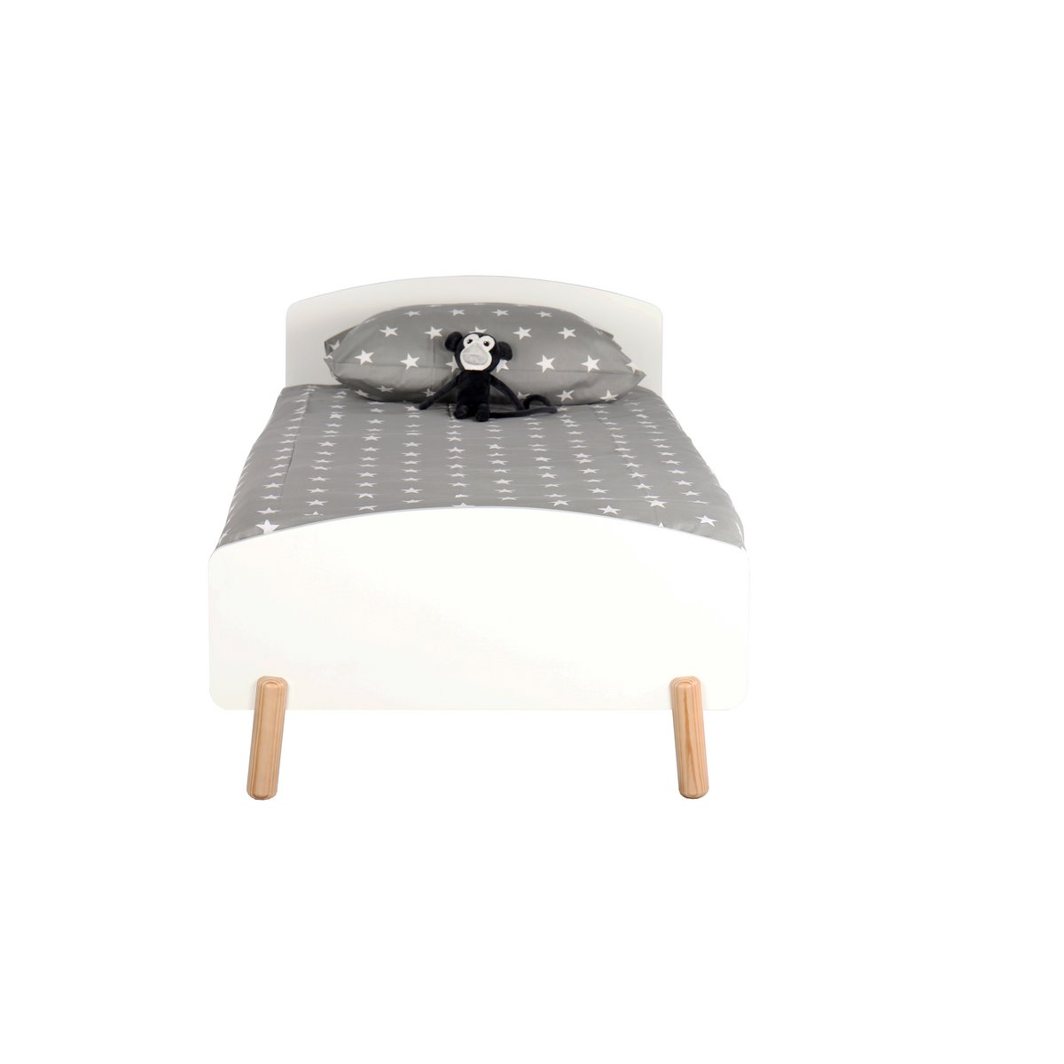 Vue latérale du lit minimaliste blanc