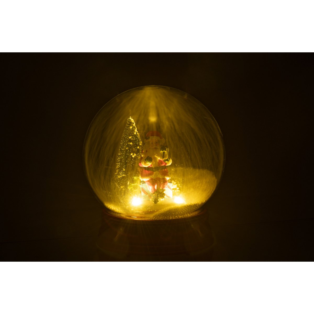 Boule à Neige LED Père Noël J-Line sur une table décorée