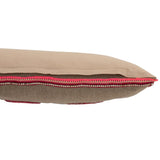 Vue latérale du coussin J-Line, montrant la texture en jute