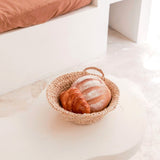 Bol RAGA utilisé comme corbeille à pain sur une table élégante