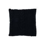 Coussin J-Line Twist noir dans un salon moderne