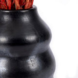 Le vase brûlé