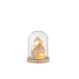 Cloche LED Maison d'Hiver, ambiance chaleureuse sur une table