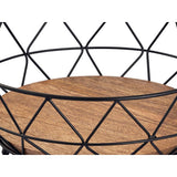 Bol à fruits en métal noir sur une table élégante