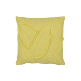 Coussin J-Line Leaves sur une table basse, style élégant
