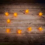 Chaîne légère LED "étoiles 3D" en plastique en jaune, avec des LED fermement installées, décorations de Noël pour l'extérieur