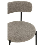 Chaise Bouclé J-Line sur un fond neutre, mise en valeur du design.