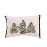 Coussin J-Line sur un lit, ajoutant une touche de Noël