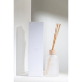 Diffuseur J-Line Fleur Blanche - mise en scène dans un salon moderne