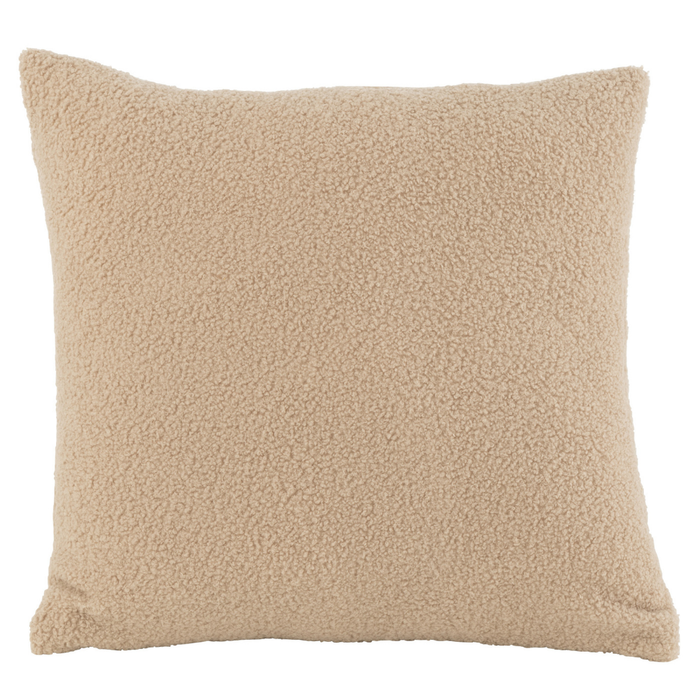 Coussin Teddy Bouclé J-Line en polyester beige sur canapé
