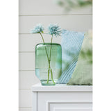 Vase J-Line de Nora en situation sur une table, design moderne