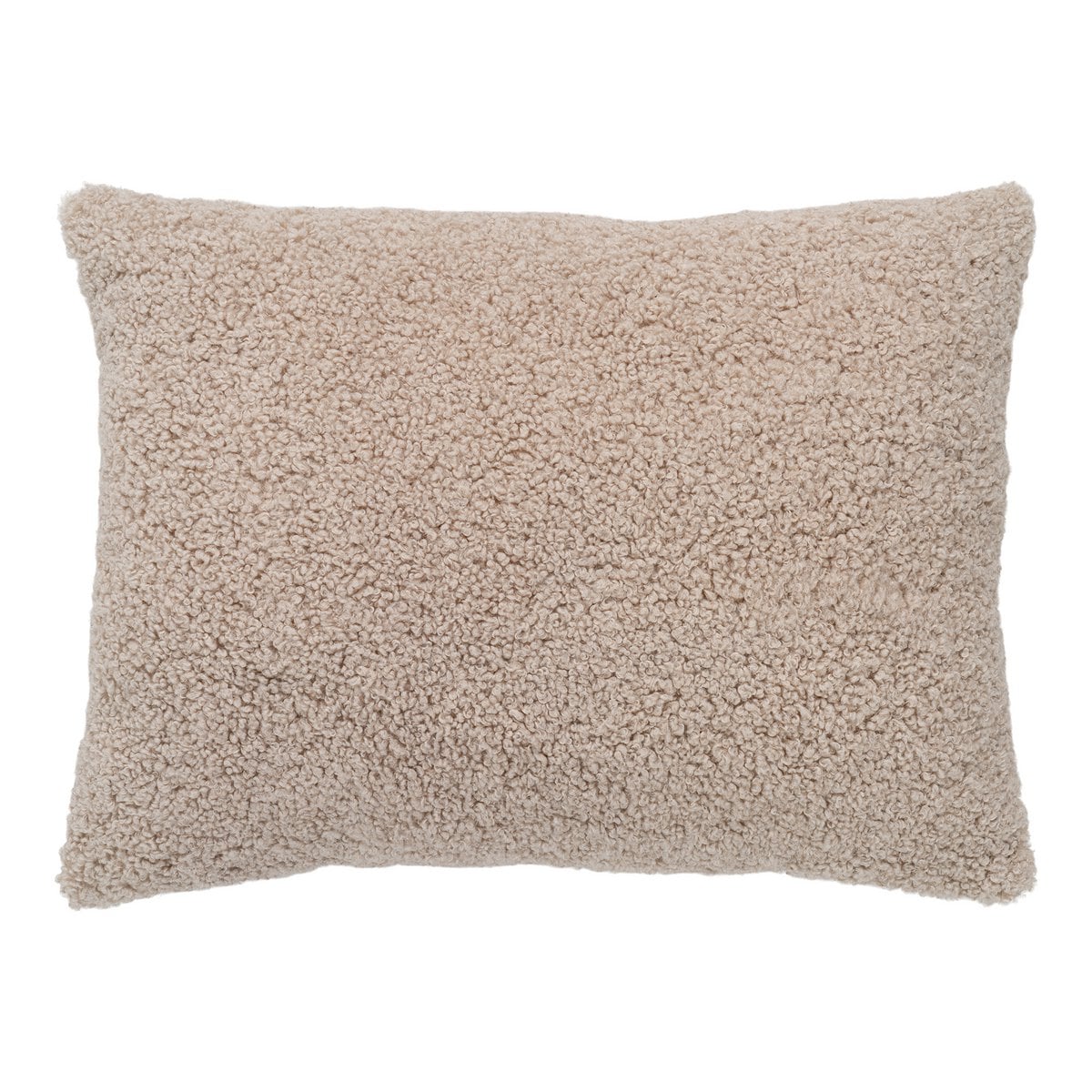 Coussin Tavira en tissu bouclé gris-marron sur un canapé