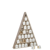 Calendrier de l'Avent J-Line sur une table de Noël décorée