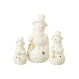 Figurine de Noël J-Line sur une table décorée