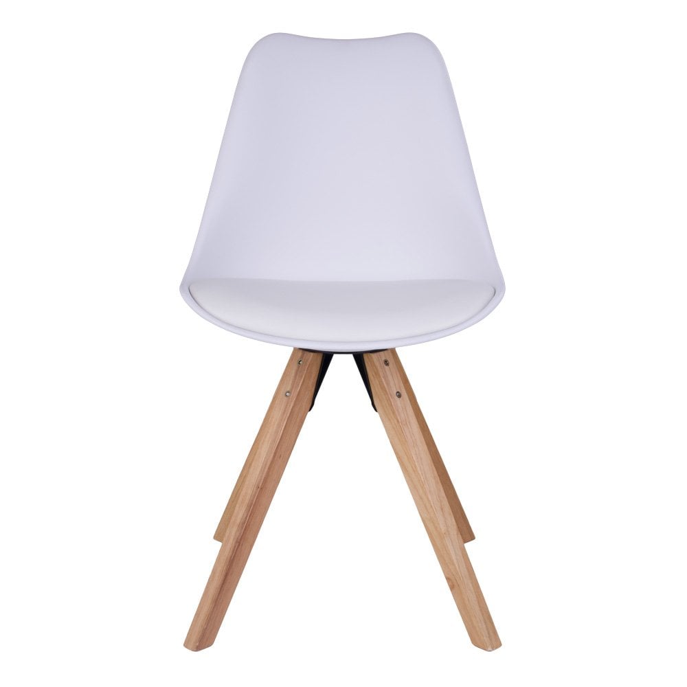 Chaise Bergen en cuir PU blanc dans une salle à manger moderne