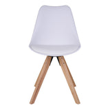 Chaise Bergen en cuir PU blanc dans une salle à manger moderne