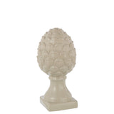 Pomme de pin J-Line sur une table moderne, ambiance chic