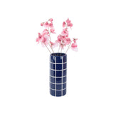 Vue de profil du Vase Retro Tiles Round Medium montrant sa forme cylindrique