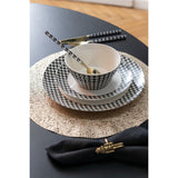 Assiette J-Line présentée sur une table élégante, ambiance raffinée