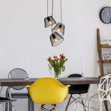 La lampe suspendue à 3 places "Korie" pendante en métal en noir, avec des versions E27, Ø30 cm, pour le salon et le bureau.
