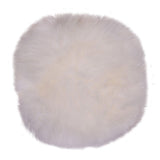 Coussin rond en peau d'agneau, ambiance scandinave cosy