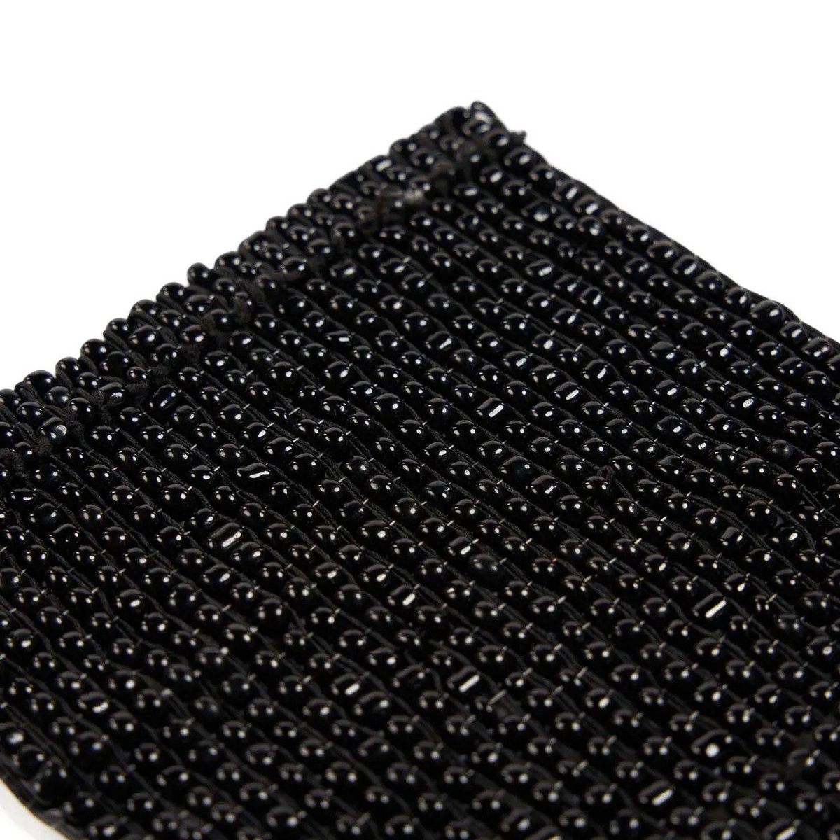Dessous de verre Perles noir en usage avec boisson