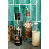 Bouteille de décoration J-Line en verre marron avec coquillages, vue de face