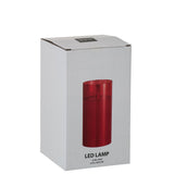Gros plan sur la texture en verre rouge de la lampe J-Line