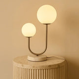Lampe à poser en marbre blanc et métal doré