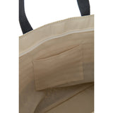 Détail du motif en papier et coton beige et noir sur le sac J-Line