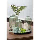 Vase J-Line en verre vert, gros plan sur la texture du verre